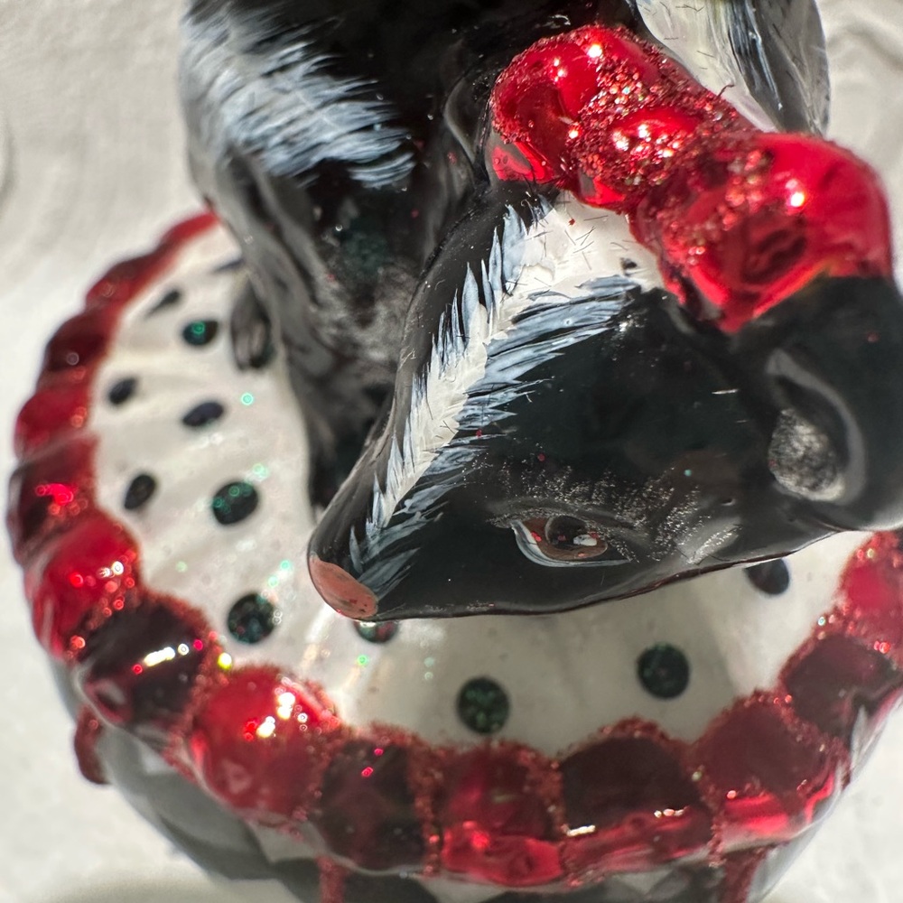 MacKenzie-Childs Glass Black and White Skunk Ornament with Red Accents - Picture 2 of 7